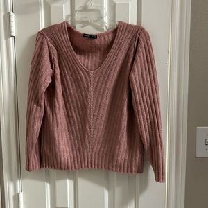 Pink sweater. Stretches   Very soft. Small